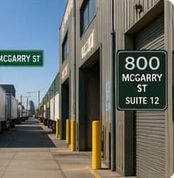 The McGarry Street sign beside the 800 McGarry St, Suite 12 entrance at the Los Angeles Produce Market.